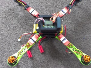 Harness and battery attached to the frame and ESCs